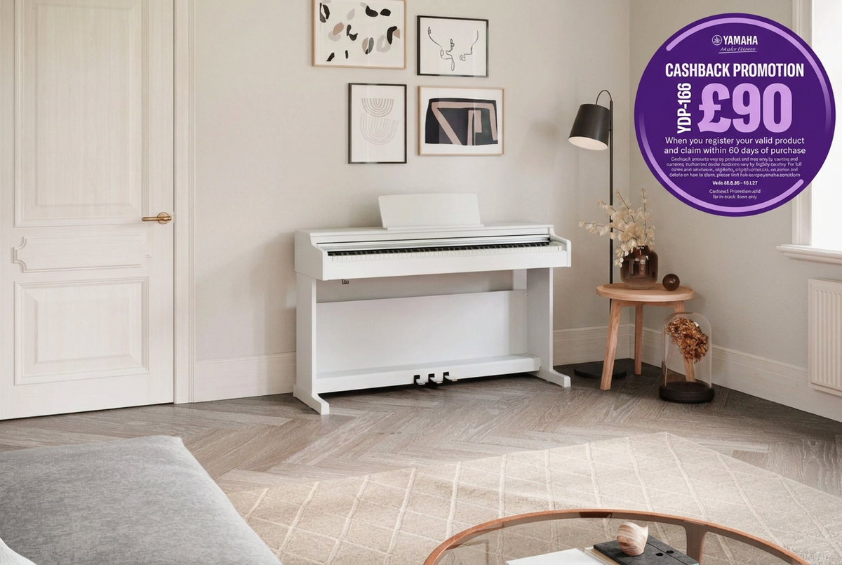 White Yamaha piano in a room with £90 cashback promotion badge